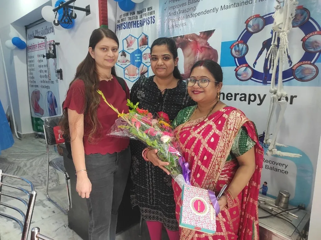 Dr. Ankita Prasad and Clinic Team with Patient Celebration Flowers
